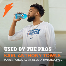 Gatorade Frost Riptide Rush bottle close-up, energizing option for practice sessions.