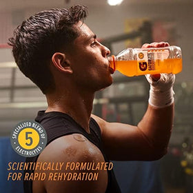 Gatorlyte Cherry Lime bottle being poured to visualize refreshing hydration