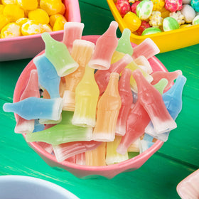 GEEOOLLAH wax bottle candy in a party bowl display.