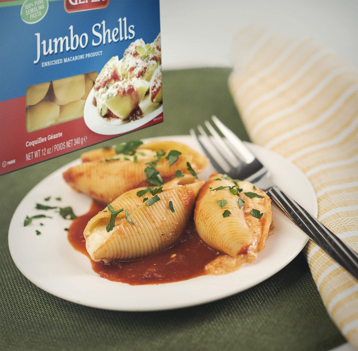 Gefen jumbo pasta shells cooked plate, comforting baked dish.