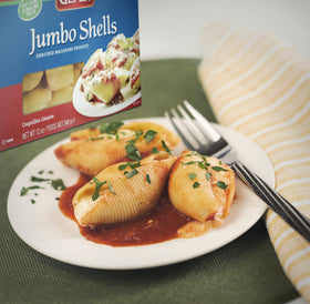 Gefen jumbo pasta shells cooked plate, comforting baked dish.
