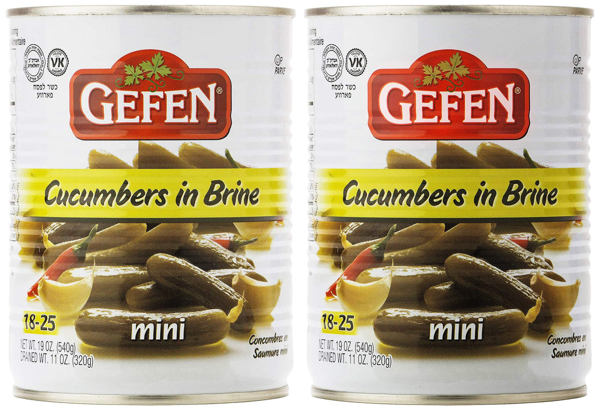 Gefen mini pickled cucumber in brine jar, crisp bite perfect for salads.