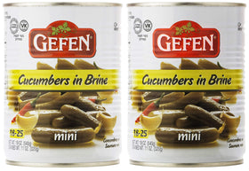 Gefen mini pickled cucumber in brine jar, crisp bite perfect for salads.