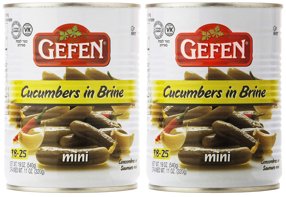Gefen mini pickled cucumber in brine jar, crisp bite perfect for salads.