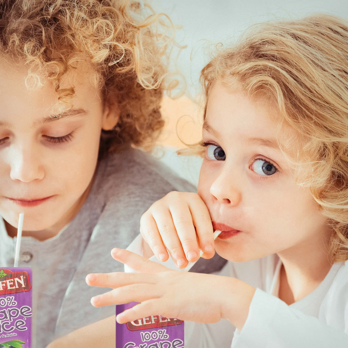 Gefen grape juice box at a party for quick serving