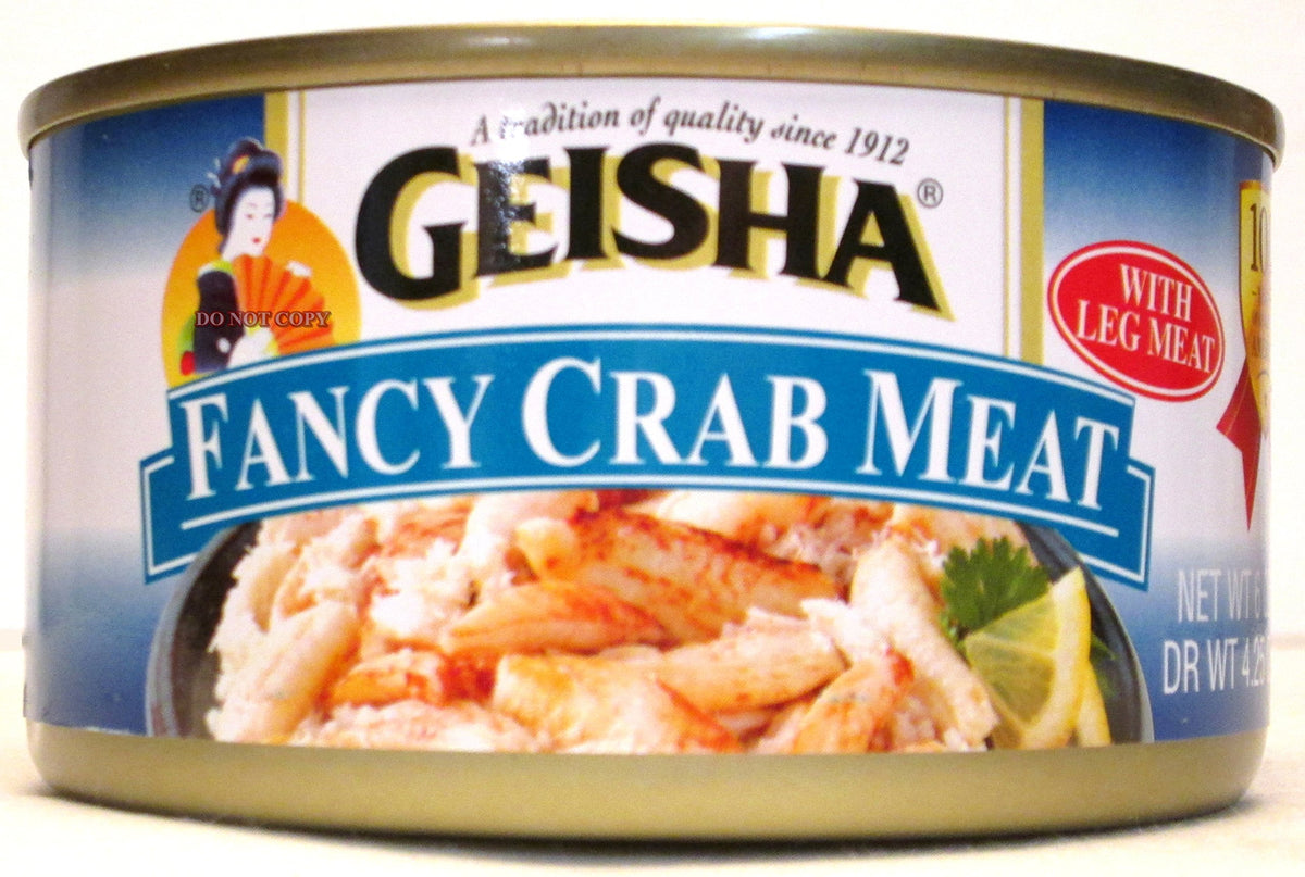 Geisha wild caught fancy crab meat pack, three 6 oz cans, ideal for quick meals.