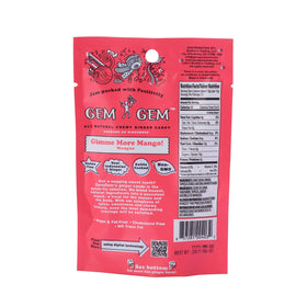 Fresh ginger root beside Gem Gem candy for authenticity