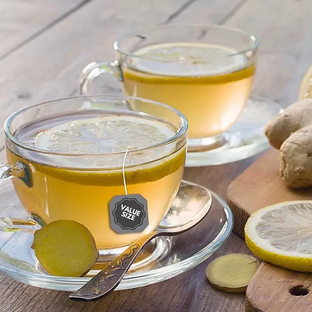Brewing moment with Generic Bigelowwss Lemon Ginger Tea releasing citrus fragrance.