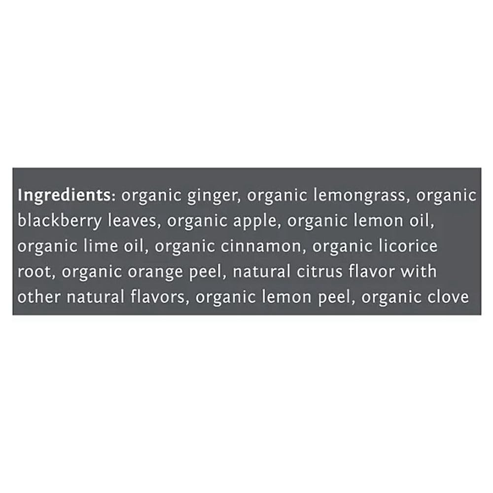 Teacup steam reveals vibrant golden infusion from lemon ginger blend.