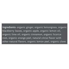 Teacup steam reveals vibrant golden infusion from lemon ginger blend.