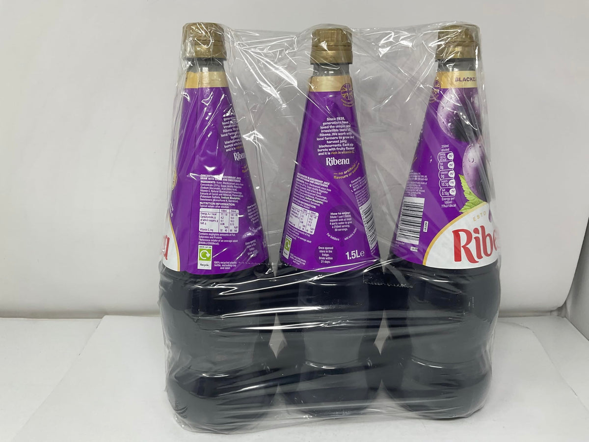 Generic blackcurrant concentrate in a glass with a refreshing drink, illustrating serving idea.