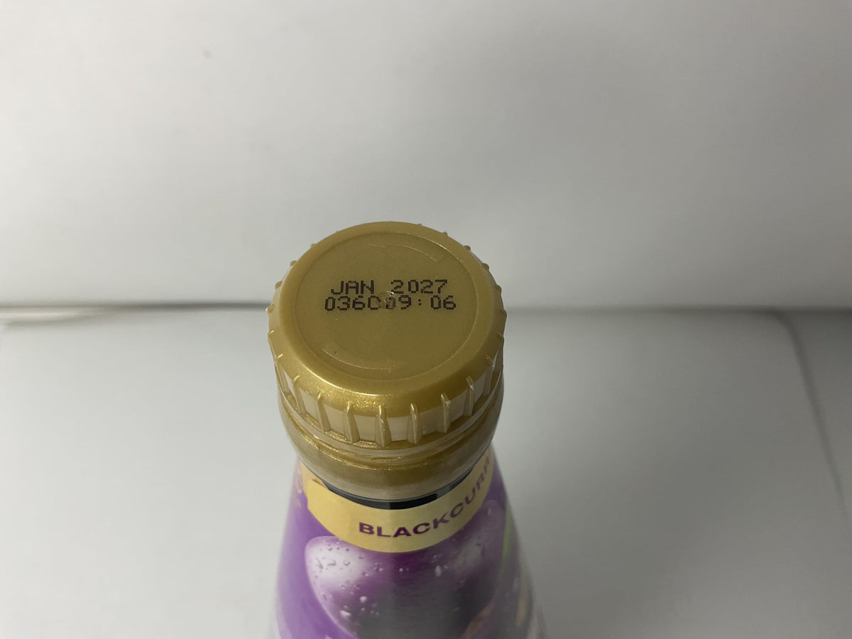 Generic blackcurrant concentrate on kitchen counter ready for everyday recipes.
