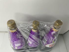Generic blackcurrant concentrate label closeup highlighting natural color and packaging.
