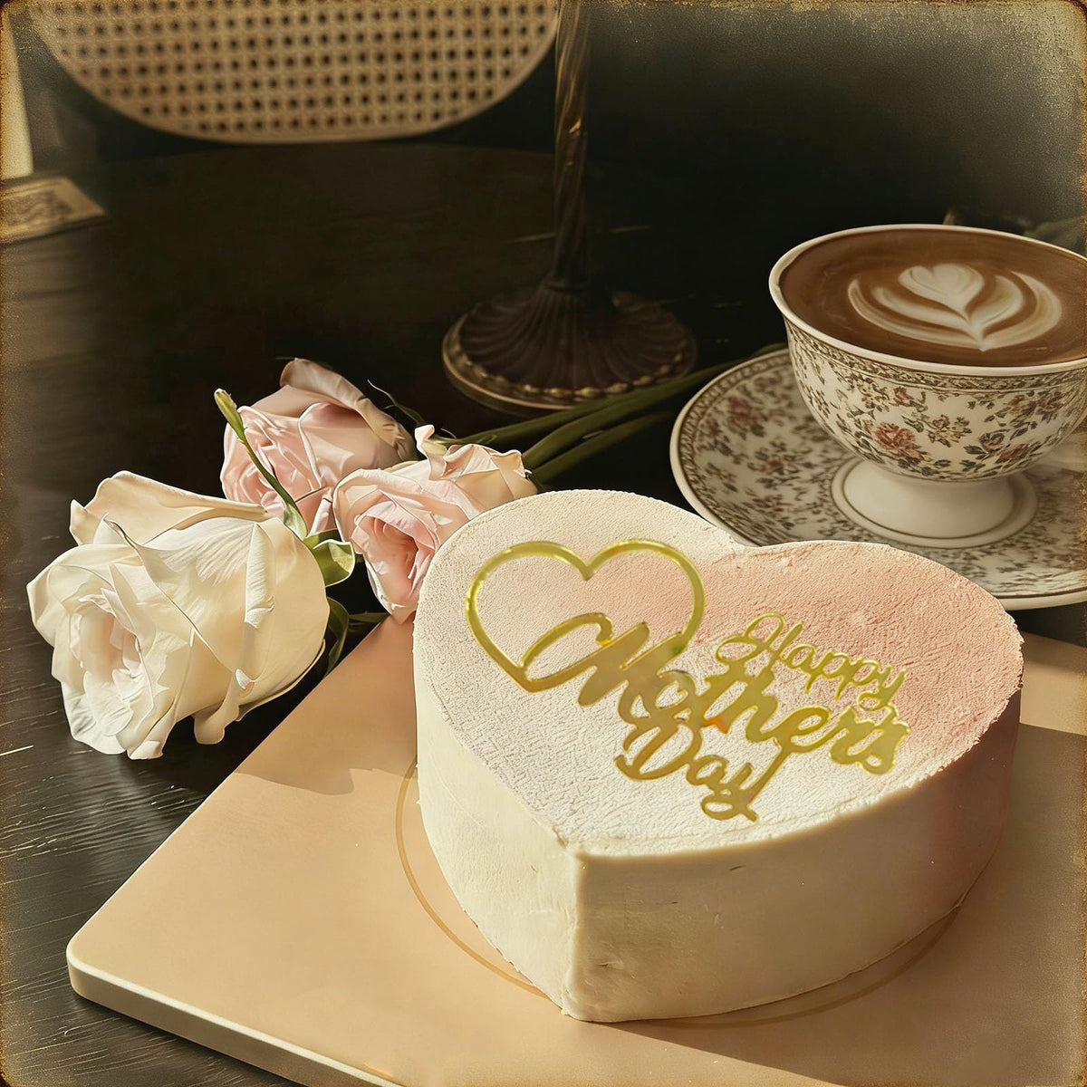 Generic elegant gold heart topper for Mother's Day creates refined dessert accents.