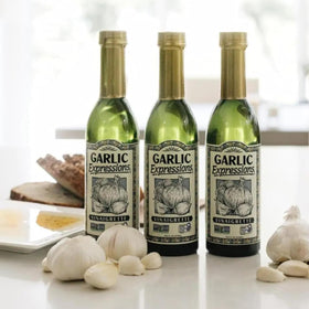 Generic Garlic Expressions vinaigrette bottle label emphasizes small-batch premium ingredients.