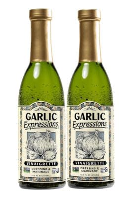 Generic Garlic Expressions vinaigrette bottle pour highlights zesty flavor for salads.