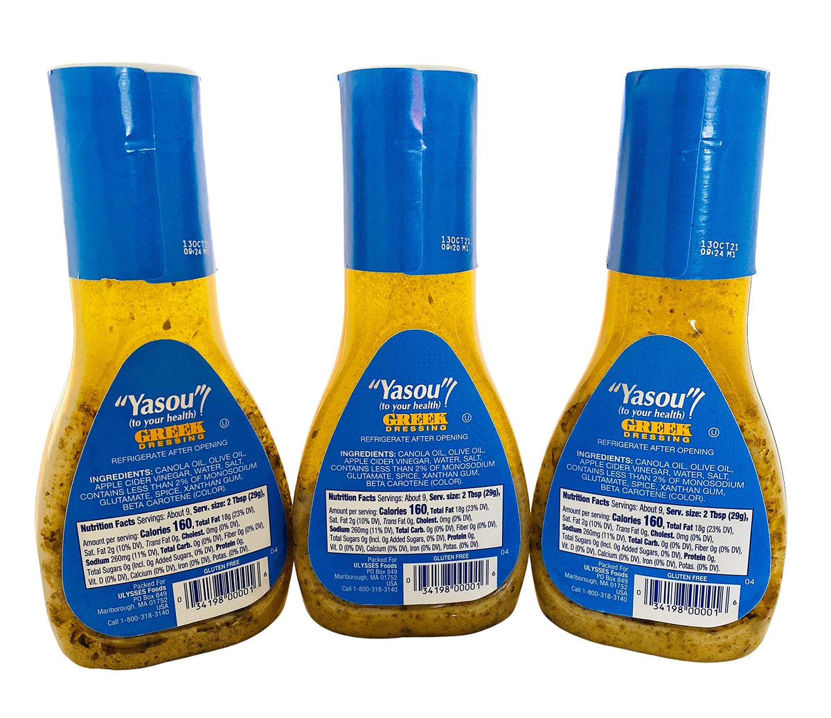 Generic Greek Dressing pouring on salad for finishing touch