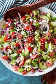 Generic Greek Dressing on salad bowl as savory topping