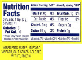 Generic hot Chinese mustard complements vegetables, rice, potstickers, and egg rolls.