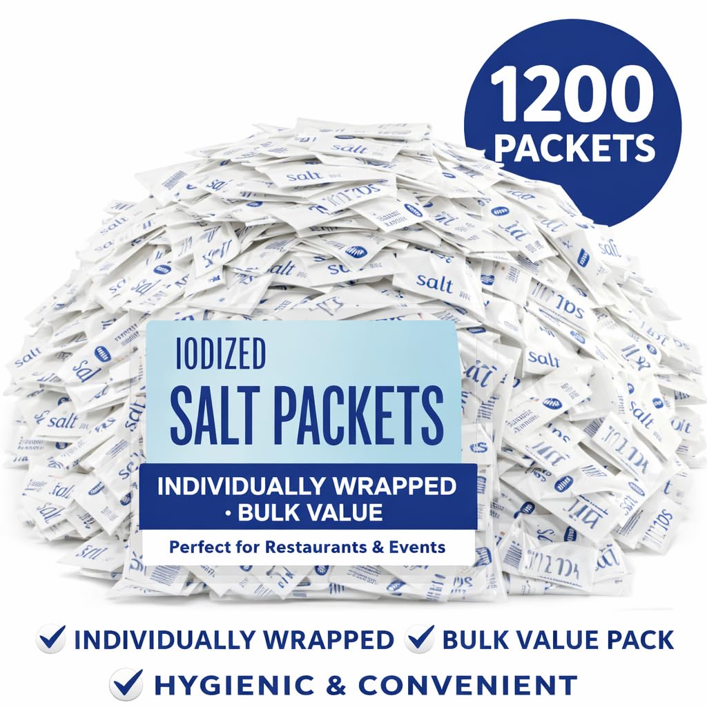 Close-up of a single 0.5g iodized salt packet for precise portioning at tables.