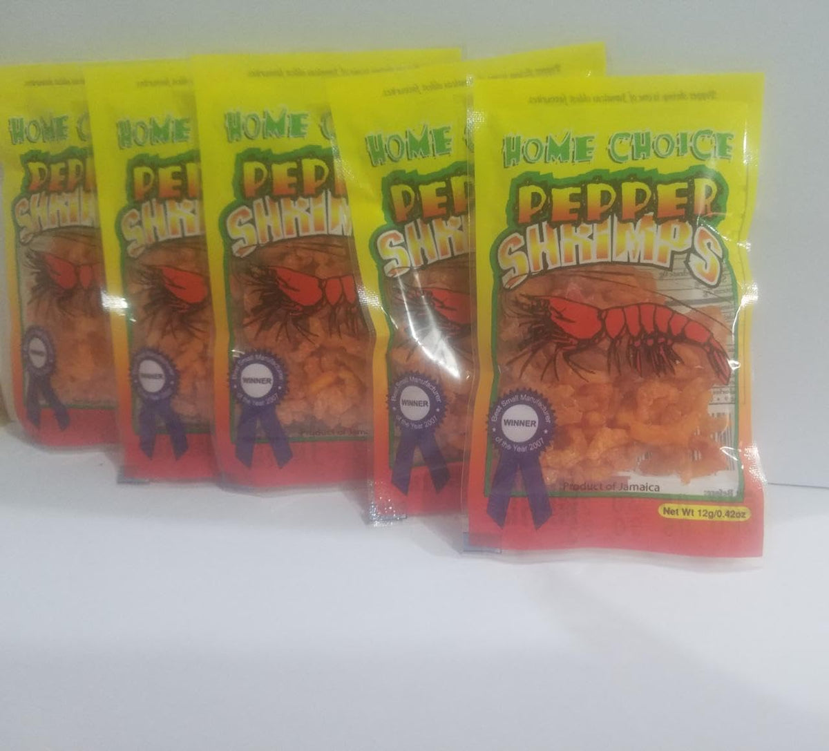 Generic Jamaican Peppered Shimps served on plate as an elegant hors d'oeuvre