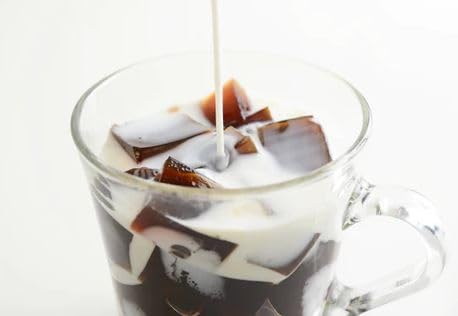 Generic Japanese Coffee Jelly cups closeup reveals glossy, jiggle texture ideal for desserts.
