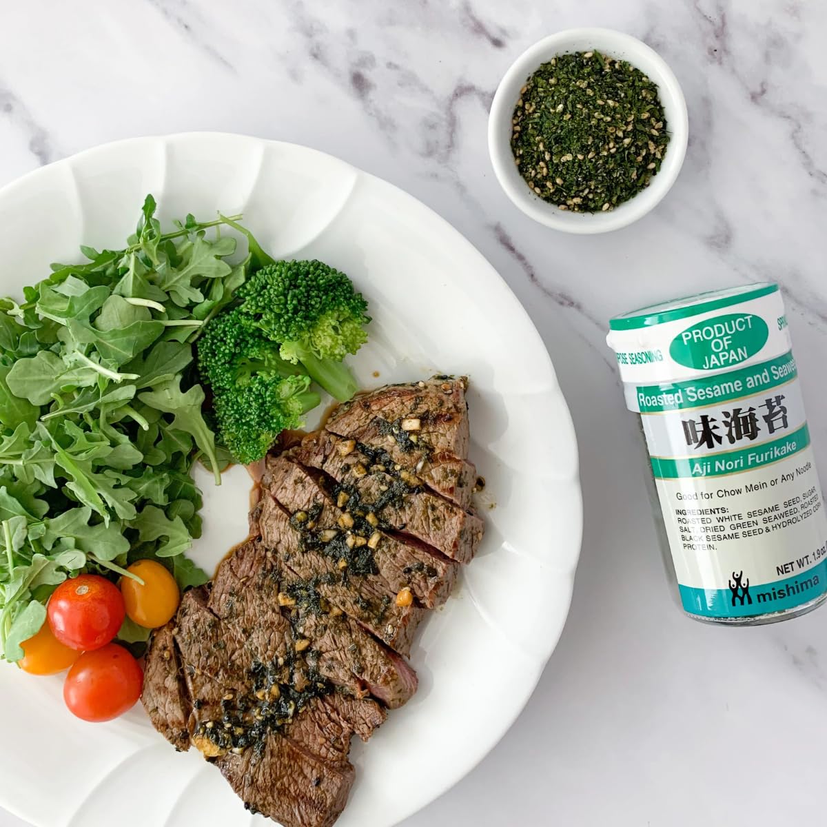 Generic Furikake sprinkled over a bowl of rice for authentic Japanese flavor