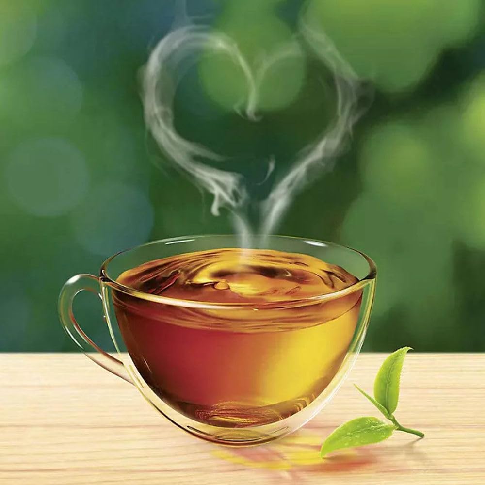 Aromatic Liptonnnsss black tea steam rising from a cup.