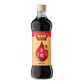 Generic Master Black Vinegar bottle on a kitchen shelf, ideal for marinades.