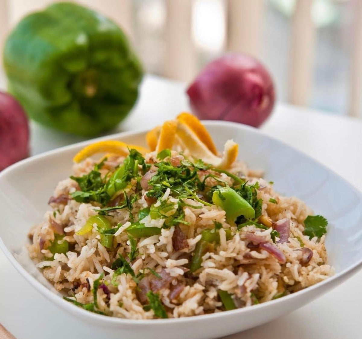 Generic Rose Hill Flavo Rice Seasoning jar closeup showing versatile kitchen use.