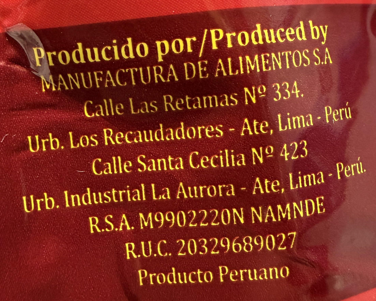 Generic Sibaritaa Aji Panca bottle pour demonstrates versatile sauce for anticuchos and stews.