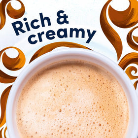 Creamy Gevalia foam crown atop caramel macchiato at home