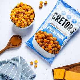 G.H. Cretors cheddar popcorn detail highlighting sharp cheese flavor.