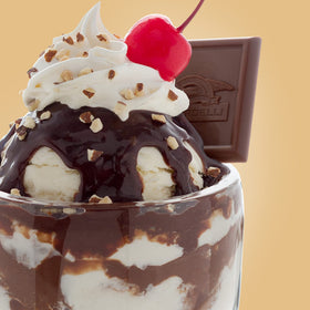 Ghirardelli Black Label bottle used in milkshakes for creamy texture and flavor.