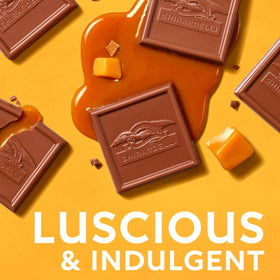 Ghirardelli caramel milk chocolate squares bar close-up showing glossy chocolate and caramel core.