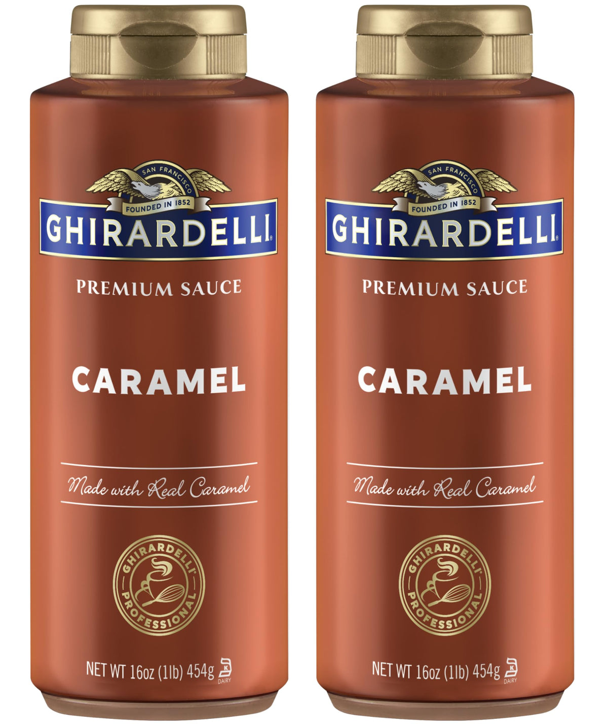 Ghirardelli caramel sauce bottles ready for topping desserts on a kitchen counter.