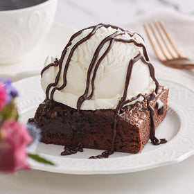 Ghirardelli Caramel Sauce added to hot chocolate for caramel depth.