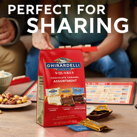 Ghirardelli chocolate caramel squares assortment image showing milk, dark, and white varieties.