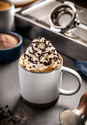 Ghirardelli mini chips melting into hot chocolate for a smooth mocha