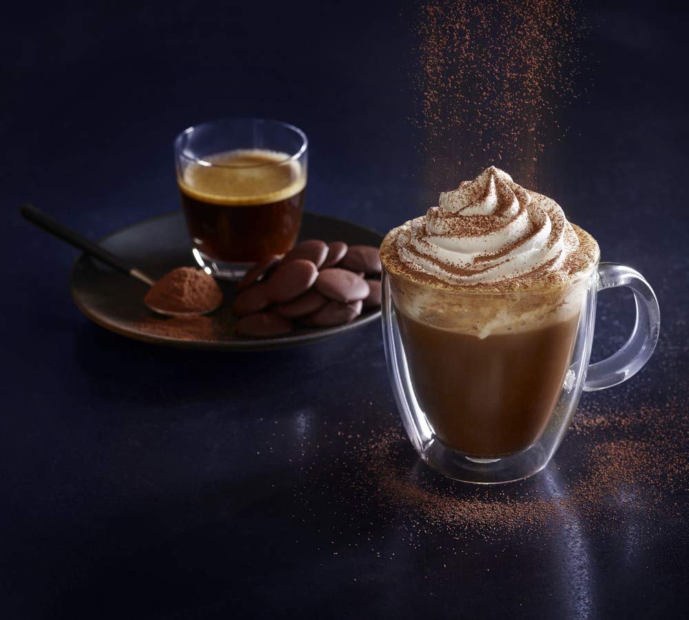 Ghirardelli dark chocolate cocoa powder featured on a dessert plate as a versatile topping option.