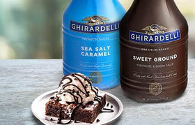 Ghirardelli dessert plate with caramel drizzle and treats.