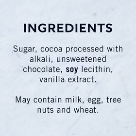 Mug steaming with Ghirardelli hot cocoa, inviting aroma and cozy warmth.