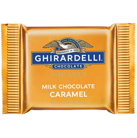 Closeup of Ghirardelli milk chocolate squares with caramel center.