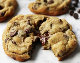 Ghirardelli oven-baking shelf captures aroma rising as cookies bake.
