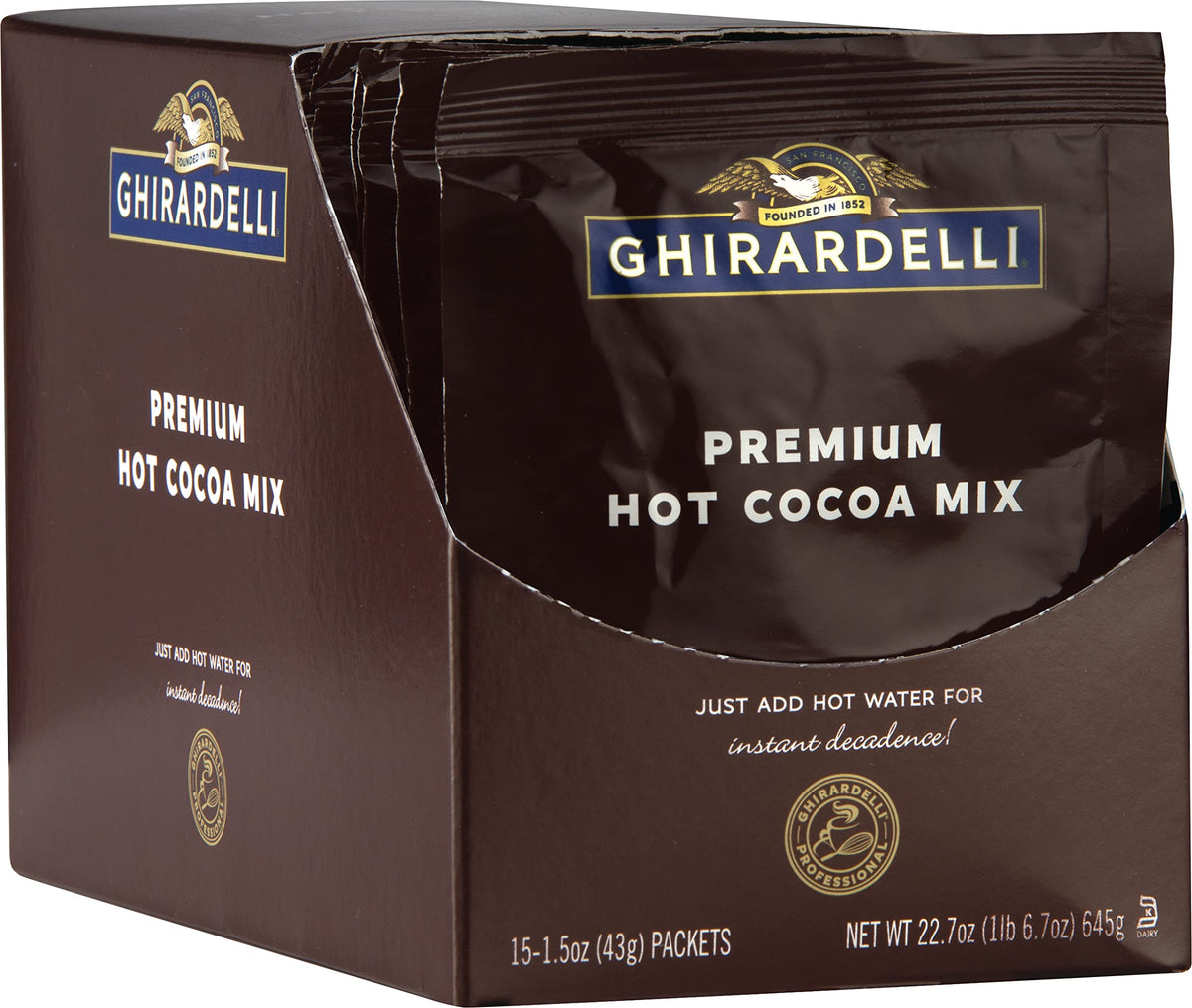 Ghirardelli Premium Hot Cocoa Envelopes pack of 15 on countertop, rich cocoa moments.