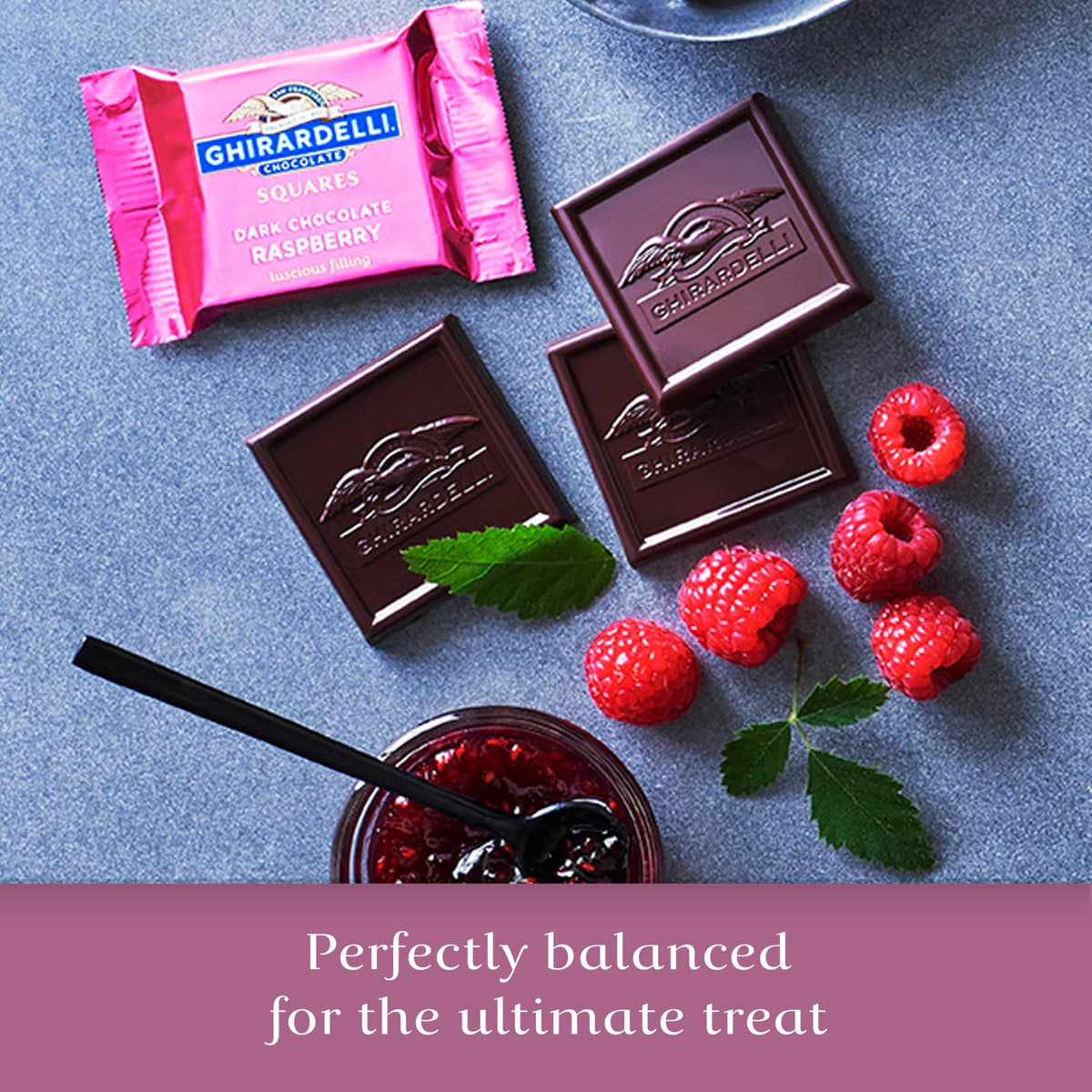 Ghirardelli dark chocolate square with raspberry center.