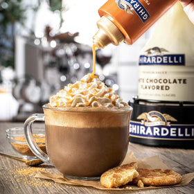 Ghirardelli sea salt caramel sauce bottle pour for decadent ice cream upgrades.