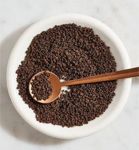Ghograjan Tea Estate handcrafted CTC leaves yield brisk, malty brew.