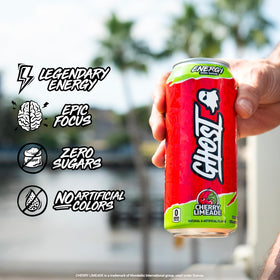 Holding a Ghost Energy can for a quick pick-me-up.