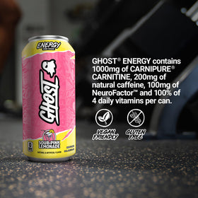 GHOST Energy Sour Pink Lemonade poured into a glass, capturing refreshing aroma.
